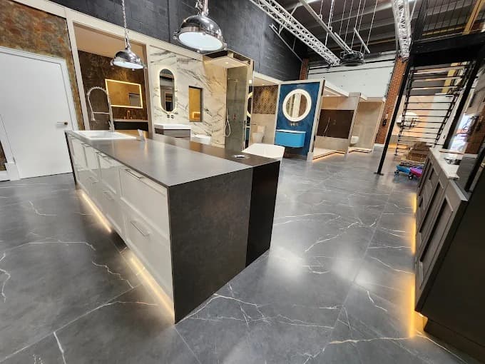 A fully styled showroom zone with layered lighting and furniture.